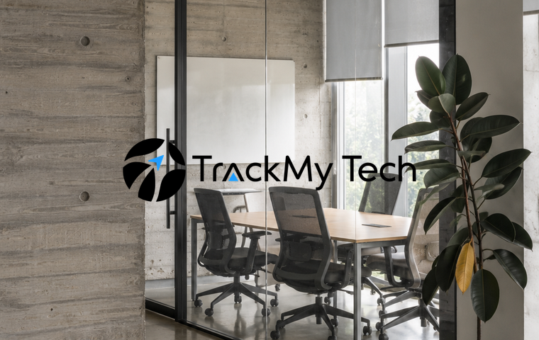 TrackMy Tech logo illegible against a detailed photograph